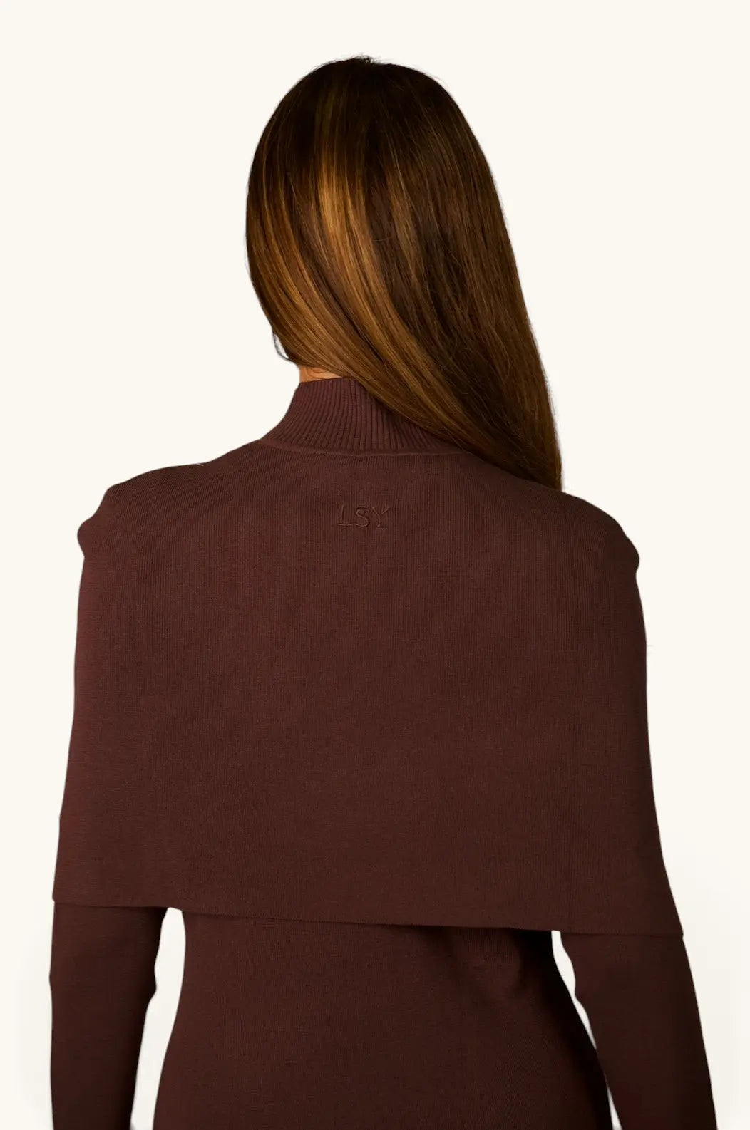 Gebreide jurk met cape-detail
